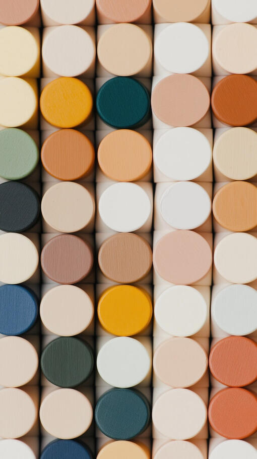 Abstract grid of multi-colored architectural tiles representing tech stack layers